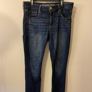 Brand: American Eagle Skinny jeans. Size: 10. Color: Darker wash.